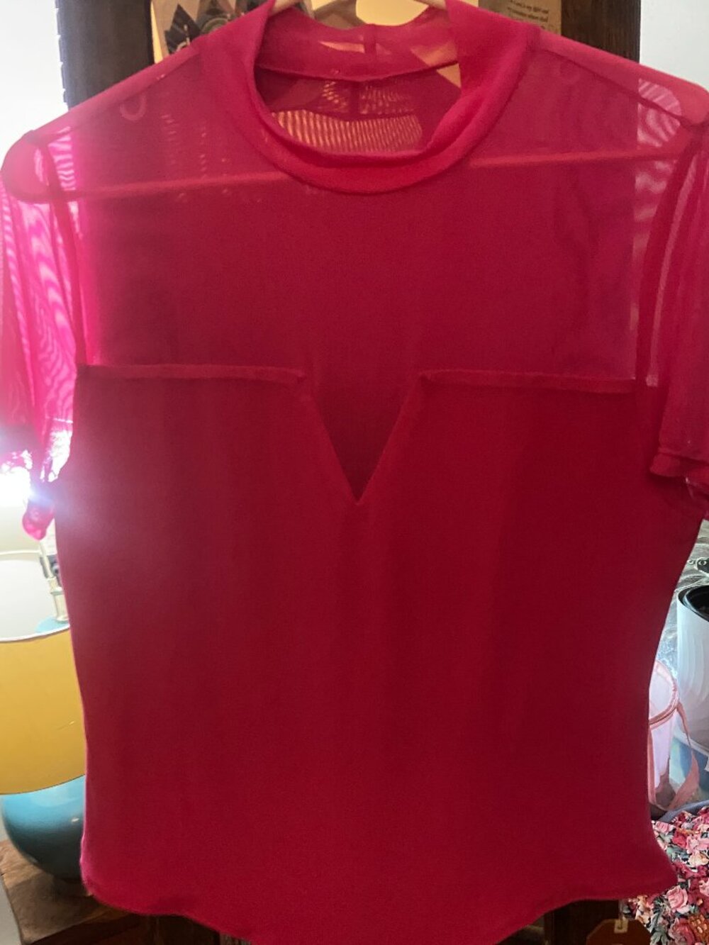 REORIA Mock Neck Cutout Bodysuit features a stylish sheer mesh